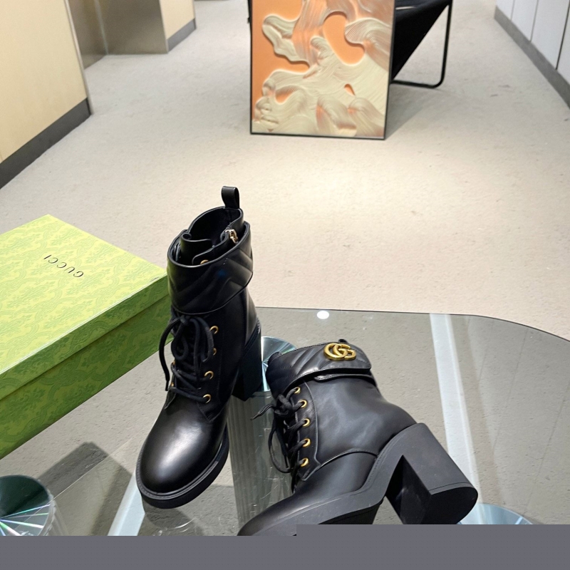 G*u*i boots